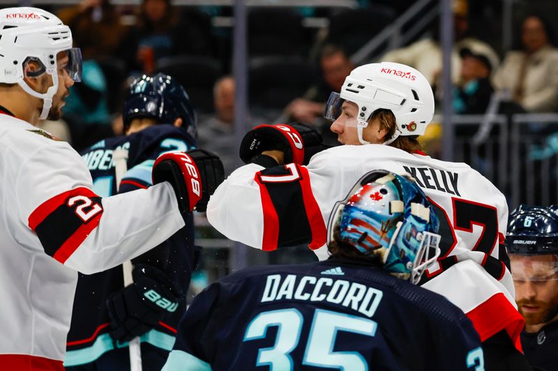 Jan 4, 2024; Seattle, Washington, USA; Ottawa Senators left wing Parker Kelly (27) celebrates after scoring a goal against the Seattle Kraken during the third period at Climate Pledge Arena. Mandatory Credit: Joe Nicholson-USA TODAY Sports