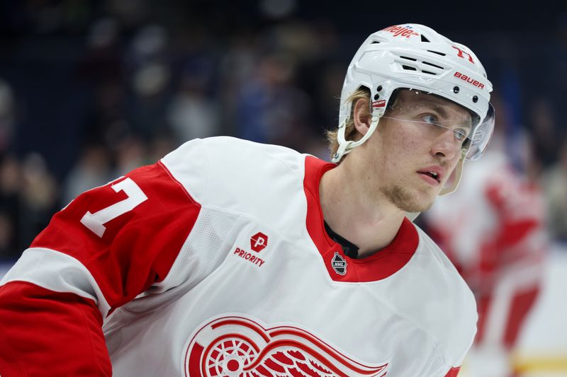 Jan 18, 2025; Tampa, Florida, USA; Detroit Red Wings defenseman Simon Edvinsson (77) warms up before a game against the Tampa Bay Lightning at Amalie Arena. Mandatory Credit: Nathan Ray Seebeck-Imagn Images