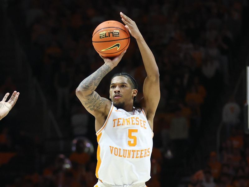 Jan 28, 2025; Knoxville, Tennessee, USA; Tennessee Volunteers guard Zakai Zeigler (5) shoots the ball against the Kentucky Wildcats during the first half at Thompson-Boling Arena at Food City Center. Mandatory Credit: Randy Sartin-Imagn Images