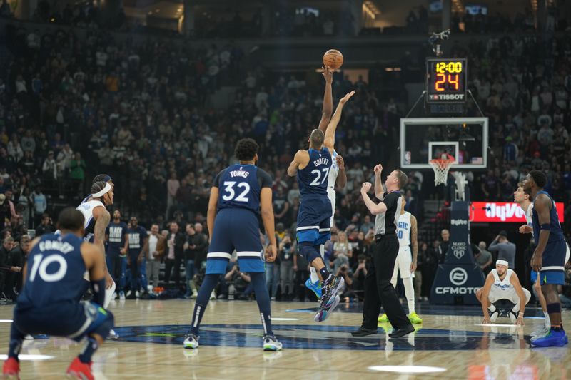 MINNEAPOLIS, MN -  FEBRUARY 2: Rudy Gobert #27 of the Minnesota Timberwolves and Wendell Carter Jr. #34 of the Orlando Magic go for the opening tip-off on February 2, 2024 at Target Center in Minneapolis, Minnesota. NOTE TO USER: User expressly acknowledges and agrees that, by downloading and or using this Photograph, user is consenting to the terms and conditions of the Getty Images License Agreement. Mandatory Copyright Notice: Copyright 2024 NBAE (Photo by Jordan Johnson/NBAE via Getty Images)