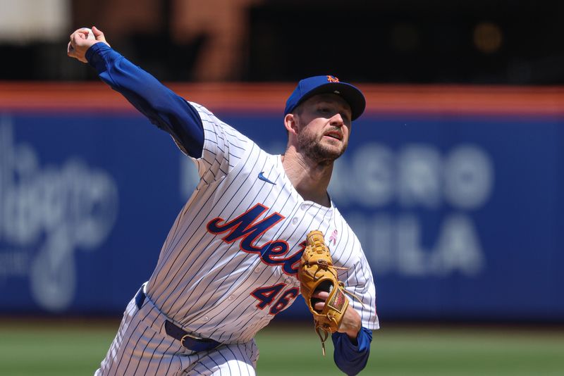 May 11, 2025; New York City, New York, USA; New York Mets starting pitcher Griffin Canning (46) delivers a pitch during the third inning against the Chicago Cubs at Citi Field. Mandatory Credit: Vincent Carchietta-Imagn Images