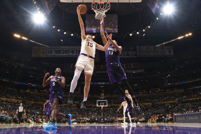 LOS ANGELES, CA - OCTOBER 26:  Austin Reaves #15 of the Los Angeles Lakers drives to the basket during the game against the Sacramento Kings on October 26, 2024 at Crypto.Com Arena in Los Angeles, California. NOTE TO USER: User expressly acknowledges and agrees that, by downloading and/or using this Photograph, user is consenting to the terms and conditions of the Getty Images License Agreement. Mandatory Copyright Notice: Copyright 2024 NBAE (Photo by Adam Pantozzi/NBAE via Getty Images)