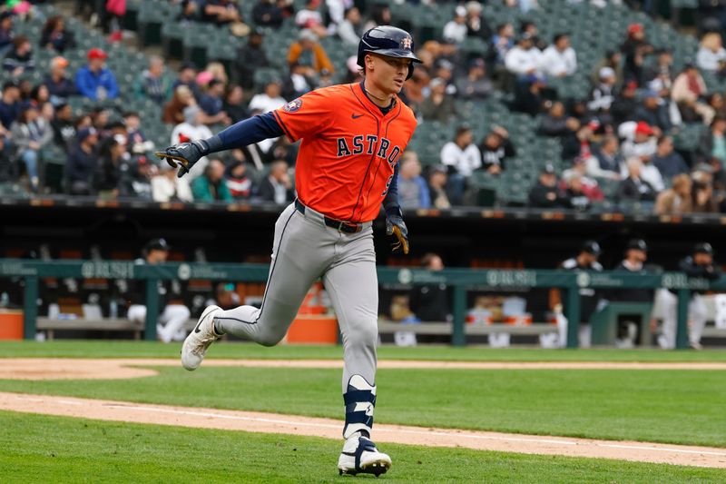 May 4, 2025; Chicago, Illinois, USA; Houston Astros right fielder Zach Dezenzo (9) rounds the bases after hitting a two-run home run against the Chicago White Sox during the fifth inning at Rate Field. Mandatory Credit: Kamil Krzaczynski-Imagn Images