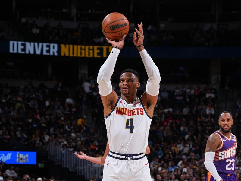 DENVER, CO - OCTOBER 13: Russell Westbrook #4 of the Denver Nuggets shoots a free throw during the game against the Phoenix Suns on October 13, 2024 at Ball Arena in Denver, Colorado. NOTE TO USER: User expressly acknowledges and agrees that, by downloading and/or using this Photograph, user is consenting to the terms and conditions of the Getty Images License Agreement. Mandatory Copyright Notice: Copyright 2024 NBAE (Photo by Garrett Ellwood/NBAE via Getty Images)