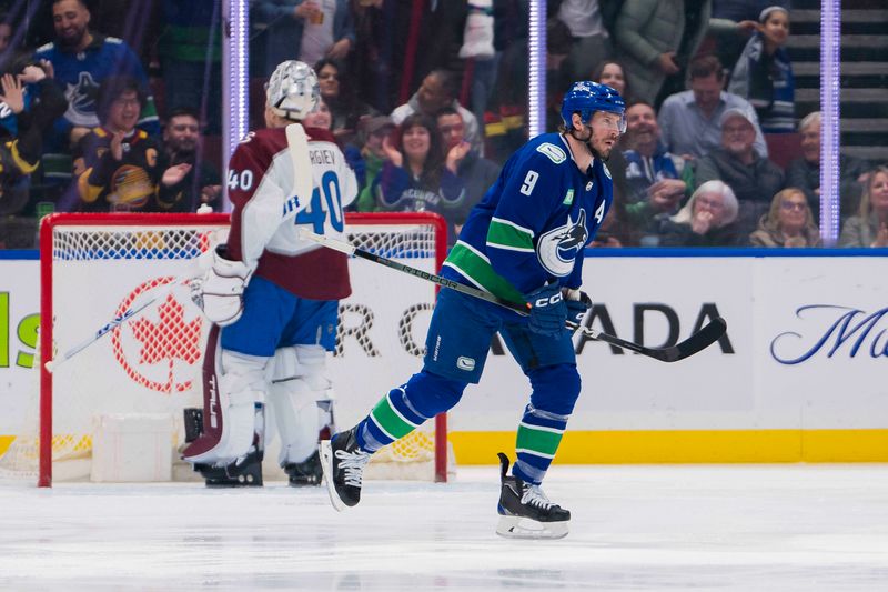 Mar 13, 2024; Vancouver, British Columbia, CAN; Vancouver Canucks forward J.T. Miller (9) celebrates his goal scored on Colorado Avalanche goalie Alexandar Georgiev (40) in the first period at Rogers Arena. Mandatory Credit: Bob Frid-USA TODAY Sports