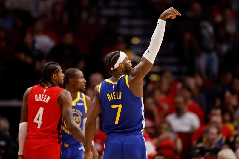 HOUSTON, TEXAS - NOVEMBER 02: Buddy Hield #7 of the Golden State Warriors reacts after a three point basket against the Houston Rockets in the first half at Toyota Center on November 02, 2024 in Houston, Texas.  NOTE TO USER: User expressly acknowledges and agrees that, by downloading and or using this photograph, User is consenting to the terms and conditions of the Getty Images License Agreement.  (Photo by Tim Warner/Getty Images)