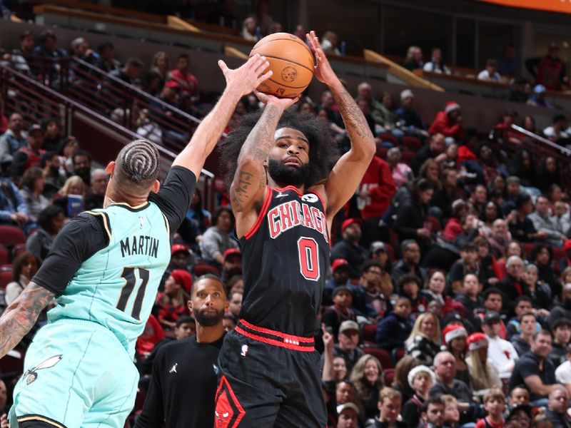 CHICAGO, IL - DECEMBER 13: Coby White #0 of the Chicago Bulls dribbles the ball during the game against the Charlotte Hornets on December 13, 2024 at United Center in Chicago, Illinois. NOTE TO USER: User expressly acknowledges and agrees that, by downloading and or using this photograph, User is consenting to the terms and conditions of the Getty Images License Agreement. Mandatory Copyright Notice: Copyright 2024 NBAE (Photo by Jeff Haynes/NBAE via Getty Images)