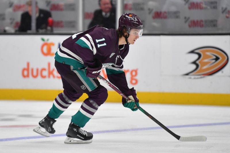 Dec 23, 2023; Anaheim, California, USA; Anaheim Ducks center Trevor Zegras (11) in action against the Seattle Kraken during the second period at Honda Center. Mandatory Credit: Gary A. Vasquez-USA TODAY Sports