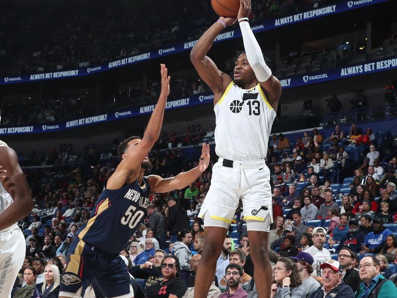 NEW ORLEANS, LA - JANUARY 17:  Isaiah Collier #13 of the Utah Jazz shoots a three point basket during the game against the New Orleans Pelicans on January 17, 2025 at the Smoothie King Center in New Orleans, Louisiana. NOTE TO USER: User expressly acknowledges and agrees that, by downloading and or using this Photograph, user is consenting to the terms and conditions of the Getty Images License Agreement. Mandatory Copyright Notice: Copyright 2025 NBAE (Photo by Layne Murdoch Jr./NBAE via Getty Images)