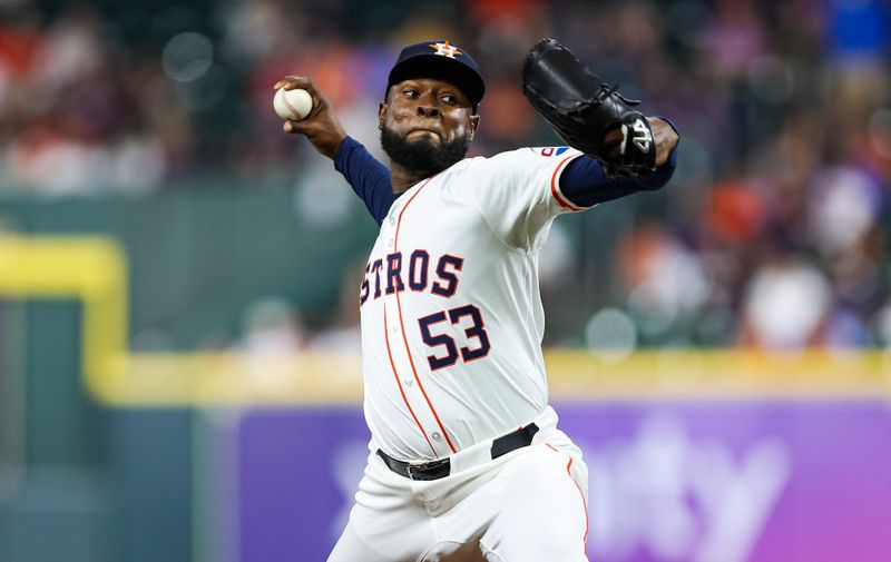 May 16, 2024; Houston, Texas, USA; Houston Astros starting pitcher Cristian Javier (53) delivers a pitch during the fourth inning against the Oakland Athletics at Minute Maid Park. Mandatory Credit: Troy Taormina-USA TODAY Sports