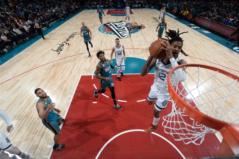 DETROIT, MI - DECEMBER 4: Ja Morant #12 of the Memphis Grizzlies drives to the basket during the game against the Detroit Pistons on December 4, 2022 at Little Caesars Arena in Detroit, Michigan. NOTE TO USER: User expressly acknowledges and agrees that, by downloading and/or using this photograph, User is consenting to the terms and conditions of the Getty Images License Agreement. Mandatory Copyright Notice: Copyright 2022 NBAE (Photo by Chris Schwegler/NBAE via Getty Images)