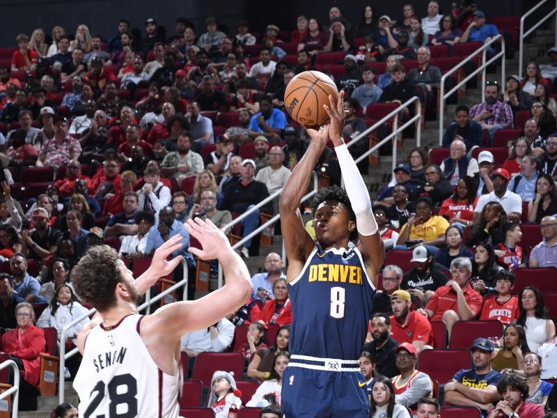 HOUSTON, TX - MARCH 23:  Peyton Watson #8 of the Denver Nuggets shoots the ball during the game against the Houston Rockets on March 23, 2025 at the Toyota Center in Houston, Texas. NOTE TO USER: User expressly acknowledges and agrees that, by downloading and or using this photograph, User is consenting to the terms and conditions of the Getty Images License Agreement. Mandatory Copyright Notice: Copyright 2025 NBAE (Photo by Logan Riely/NBAE via Getty Images)