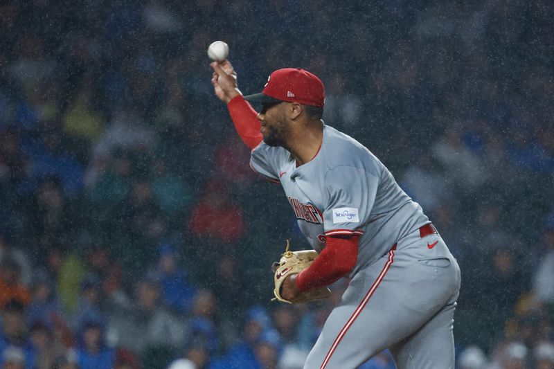 Jun 1, 2024; Chicago, Illinois, USA; Cincinnati Reds starting pitcher Hunter Greene (21) delivers a pitch against the Chicago Cubs during the first inning at Wrigley Field. Mandatory Credit: Kamil Krzaczynski-USA TODAY Sports