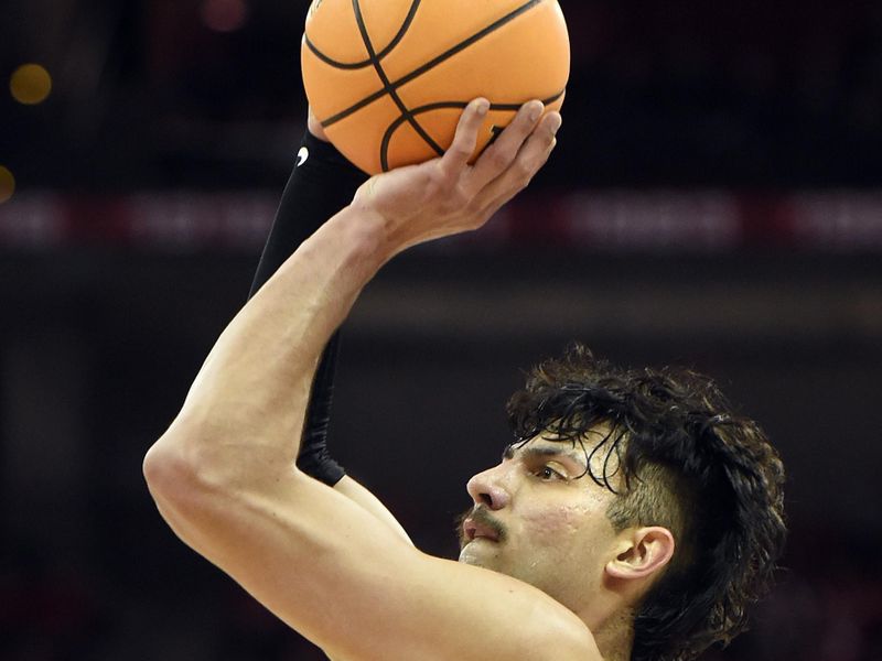 Jan 3, 2023; Madison, Wisconsin, USA;  Minnesota Golden Gophers forward Dawson Garcia (3) shoots the ball against the Wisconsin Badgers during the first half at the Kohl Center. Mandatory Credit: Kayla Wolf-USA TODAY Sports