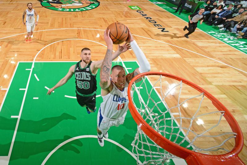 BOSTON, MA - JANUARY 27: Daniel Theis #10 of the LA Clippers drives to the basket during the game against the Boston Celtics on January 27, 2024 at the TD Garden in Boston, Massachusetts. NOTE TO USER: User expressly acknowledges and agrees that, by downloading and or using this photograph, User is consenting to the terms and conditions of the Getty Images License Agreement. Mandatory Copyright Notice: Copyright 2024 NBAE  (Photo by Brian Babineau/NBAE via Getty Images)