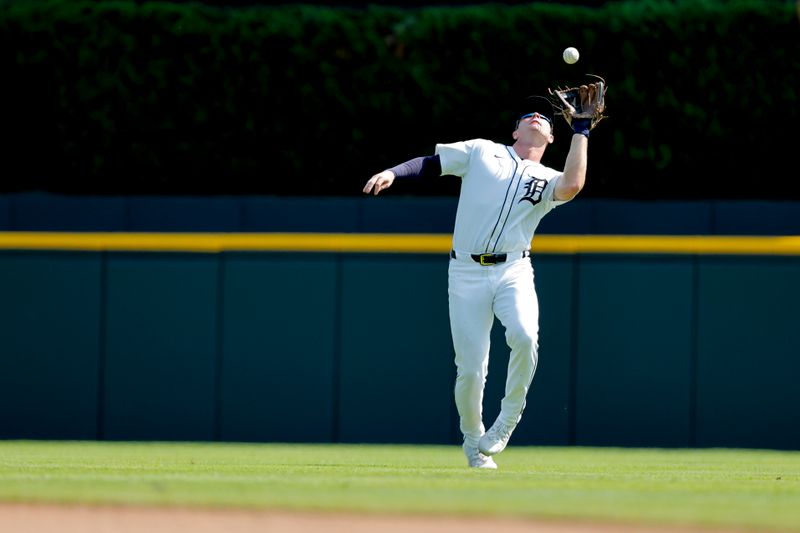 Sep 12, 2024; Detroit, Michigan, USA;  Detroit Tigers second base Colt Keith (33) makes a catch in the sixth inning against the Colorado Rockies at Comerica Park. Mandatory Credit: Rick Osentoski-Imagn Images