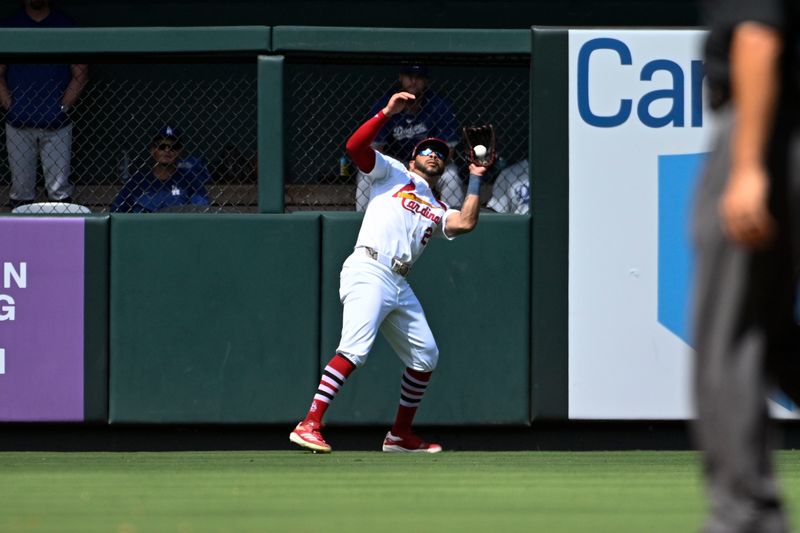 Aug 18, 2024; St. Louis, Missouri, USA; St. Louis Cardinals left fielder Tommy Pham (29) catches a fly ball hit by the Los Angeles Dodgers in the sixth inning at Busch Stadium. Mandatory Credit: Joe Puetz-USA TODAY Sports