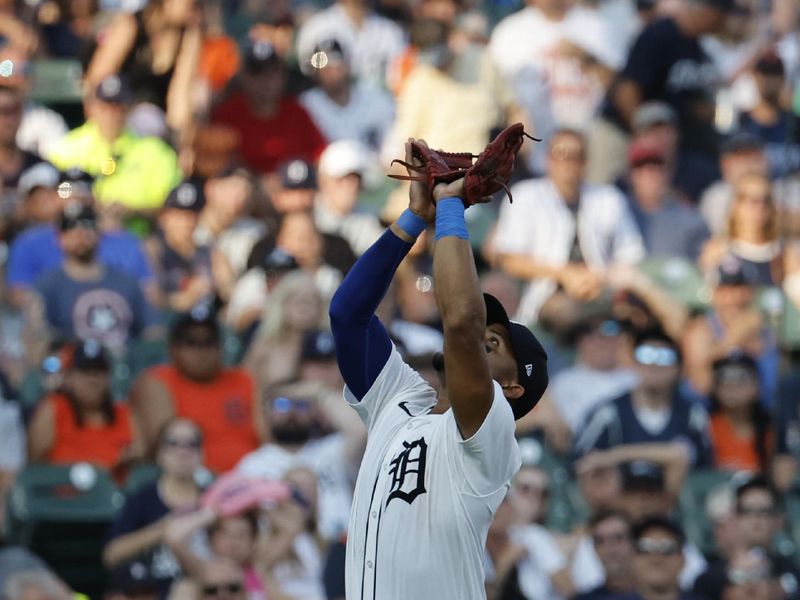 Aug 3, 2024; Detroit, Michigan, USA;  Detroit Tigers second baseman Andy Ibáñez (77) makes a catch in the fourth inning against the Kansas City Royals at Comerica Park. Mandatory Credit: Rick Osentoski-USA TODAY Sports