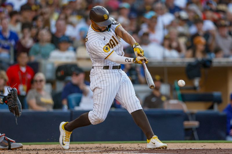 Jul 29, 2023; San Diego, California, USA;  San Diego Padres shortstop Xander Bogaerts (2) singles to left field in the second inning against the Texas Rangers at Petco Park. Mandatory Credit: David Frerker-USA TODAY Sports