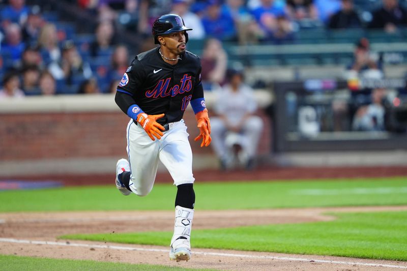 May 31, 2024; New York City, New York, USA; New York Mets shortstop Francisco Lindor (12) runs out an RBI double against the Arizona Diamondbacks during the second inning at Citi Field. Mandatory Credit: Gregory Fisher-USA TODAY Sports