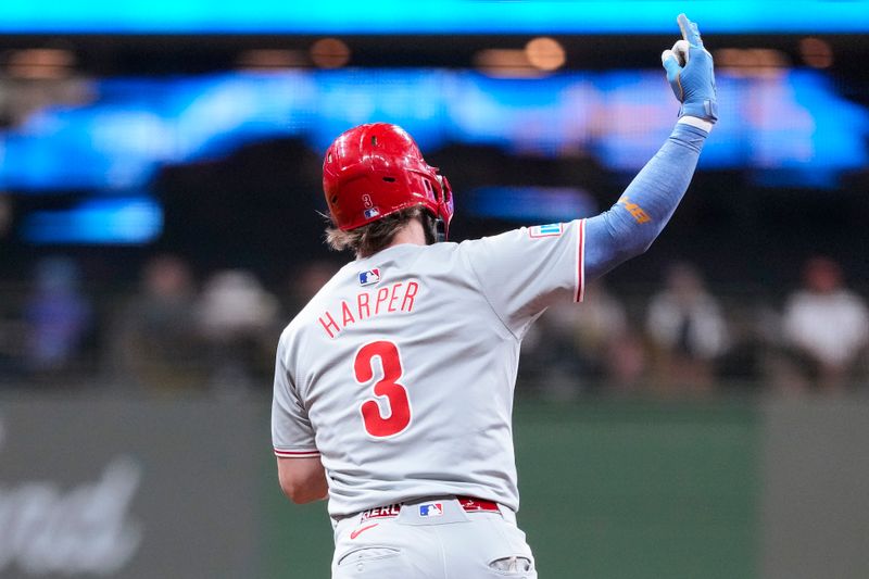 Sep 17, 2024; Milwaukee, Wisconsin, USA;  Philadelphia Phillies first baseman Bryce Harper (3) celebrates after hitting a home run during the sixth inning against the Milwaukee Brewers at American Family Field. Mandatory Credit: Jeff Hanisch-Imagn Images