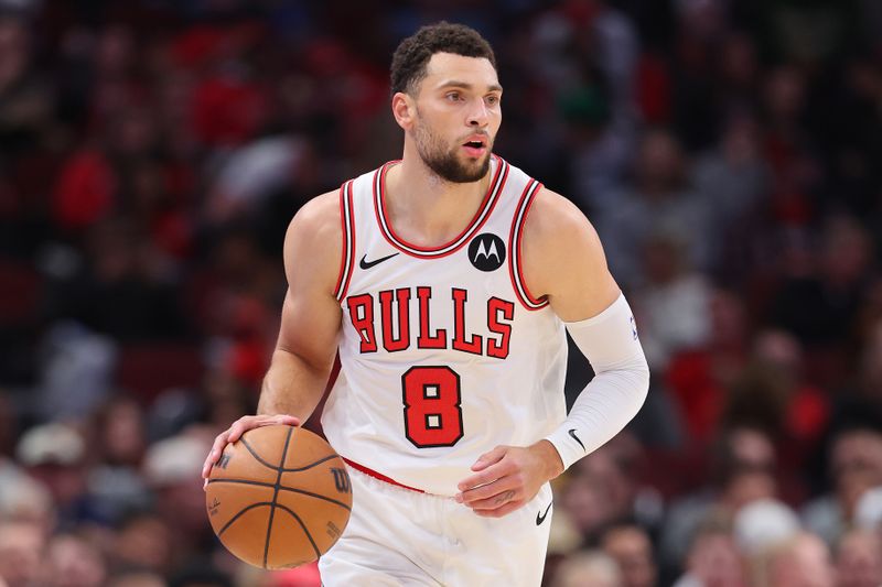 CHICAGO, ILLINOIS - NOVEMBER 06:  Zach LaVine #8 of the Chicago Bulls dribbles up the court against the Utah Jazz during the first half at the United Center on November 06, 2023 in Chicago, Illinois. NOTE TO USER: User expressly acknowledges and agrees that, by downloading and or using this photograph, User is consenting to the terms and conditions of the Getty Images License Agreement. (Photo by Michael Reaves/Getty Images)