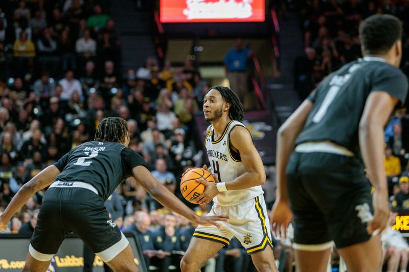 Mar 2, 2024; Wichita, Kansas, USA; Wichita State Shockers guard Colby Rogers (4) looks to pass during the first half against the Rice Owls at Charles Koch Arena. Mandatory Credit: William Purnell-USA TODAY Sports