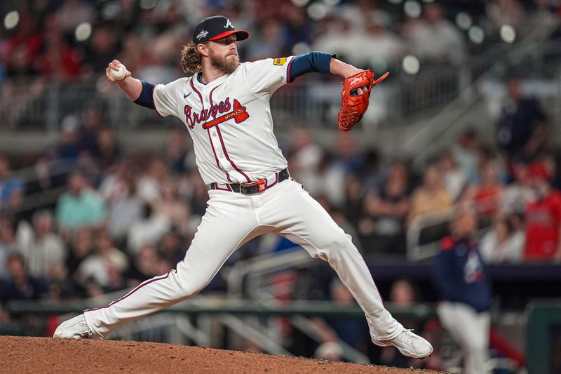 May 13, 2025; Cumberland, Georgia, USA; Atlanta Braves relief pitcher Pierce Johnson (38) pitches against the Washington Nationals during the ninth inning at Truist Park. Mandatory Credit: Dale Zanine-Imagn Images