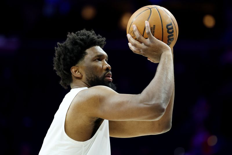 PHILADELPHIA, PENNSYLVANIA - DECEMBER 13: Joel Embiid #21 of the Philadelphia 76ers warms up before a game against the Indiana Pacers at the Wells Fargo Center on December 13, 2024 in Philadelphia, Pennsylvania. NOTE TO USER: User expressly acknowledges and agrees that, by downloading and or using this photograph, User is consenting to the terms and conditions of the Getty Images License Agreement. (Photo by Emilee Chinn/Getty Images)