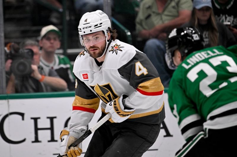 Mar 10, 2026; Dallas, Texas, USA; Vegas Golden Knights defenseman Rasmus Andersson (4) brings the puck up past Dallas Stars defenseman Esa Lindell (23) during the third period at the American Airlines Center. Mandatory Credit: Jerome Miron-Imagn Images
