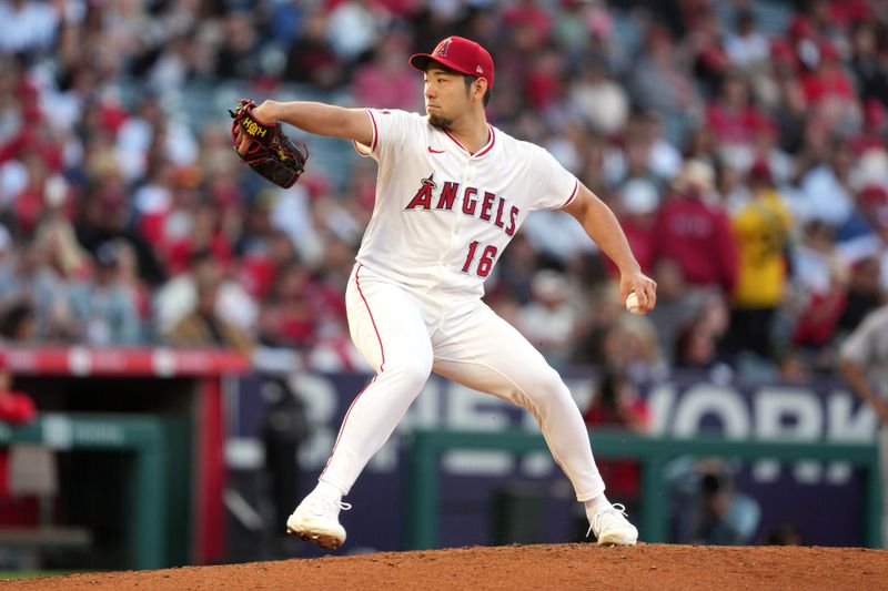 May 28, 2025; Anaheim, California, USA; Los Angeles Angels starting pitcher Yusei Kikuchi (16) throws in the second inning against the New York Yankees at Angel Stadium. Mandatory Credit: Kirby Lee-Imagn Images