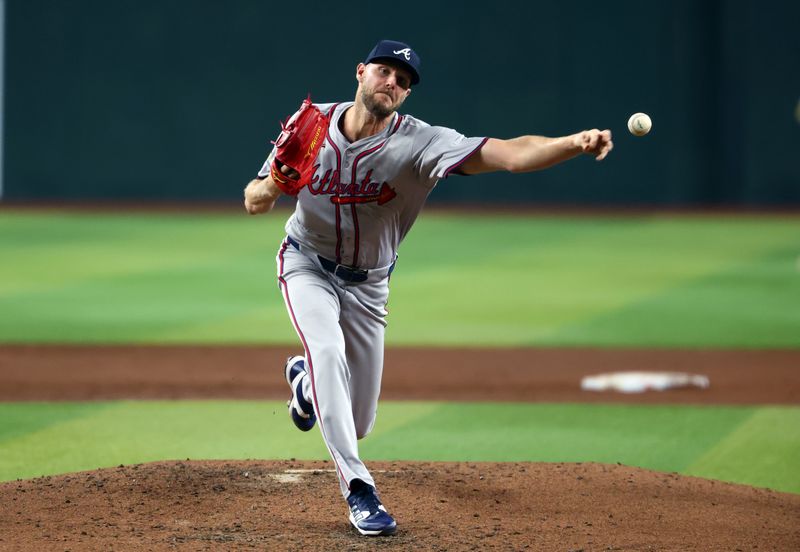 Jul 9, 2024; Phoenix, Arizona, USA; Atlanta Braves pitcher Chris Sale throws in the third inning against the Arizona Diamondbacks at Chase Field. Mandatory Credit: Mark J. Rebilas-USA TODAY Sports