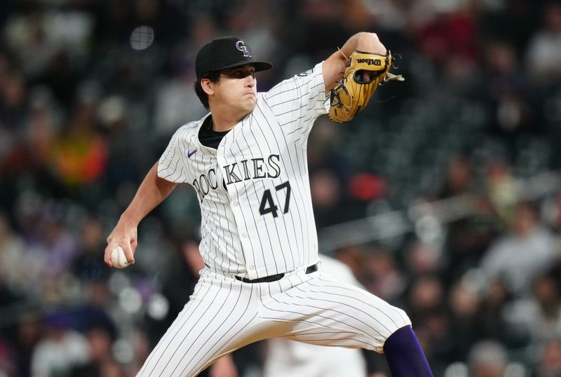 Apr 9, 2024; Denver, Colorado, USA; Colorado Rockies starting pitcher Cal Quantrill (47) delivers a pitch in the fifth inning against the Arizona Diamondbacks at Coors Field. Mandatory Credit: Ron Chenoy-USA TODAY Sports