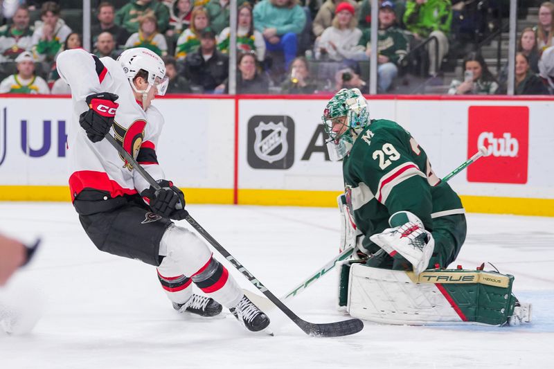 Apr 2, 2024; Saint Paul, Minnesota, USA; Ottawa Senators center Ridly Greig (71) shoots against the Minnesota Wild goaltender Marc-Andre Fleury (29) in the third period at Xcel Energy Center. Mandatory Credit: Brad Rempel-USA TODAY Sports