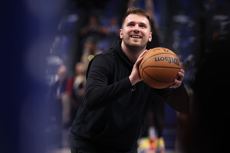 DALLAS, TEXAS - NOVEMBER 04: Luka Doncic #77 of the Dallas Mavericks warms up before the game against the Indiana Pacers at American Airlines Center on November 04, 2024 in Dallas, Texas. NOTE TO USER: User expressly acknowledges and agrees that, by downloading and or using this photograph, User is consenting to the terms and conditions of the Getty Images License Agreement. (Photo by Sam Hodde/Getty Images)