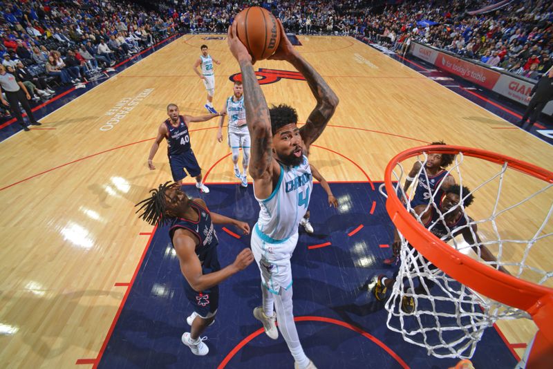 PHILADELPHIA, PA - MARCH 16: Nick Richards #4 of the Charlotte Hornets drives to the basket during the game against the Philadelphia 76ers on March 16, 2024 at the Wells Fargo Center in Philadelphia, Pennsylvania NOTE TO USER: User expressly acknowledges and agrees that, by downloading and/or using this Photograph, user is consenting to the terms and conditions of the Getty Images License Agreement. Mandatory Copyright Notice: Copyright 2024 NBAE (Photo by Jesse D. Garrabrant/NBAE via Getty Images)