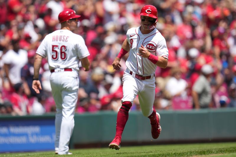 Jun 25, 2023; Cincinnati, Ohio, USA; Cincinnati Reds second baseman Matt McLain (9) scores in the third inning of a baseball game against the Atlanta Braves at Great American Ball Park. The Atlanta Braves won, 7-6. Mandatory Credit: Kareem Elgazzar-USA TODAY Sports