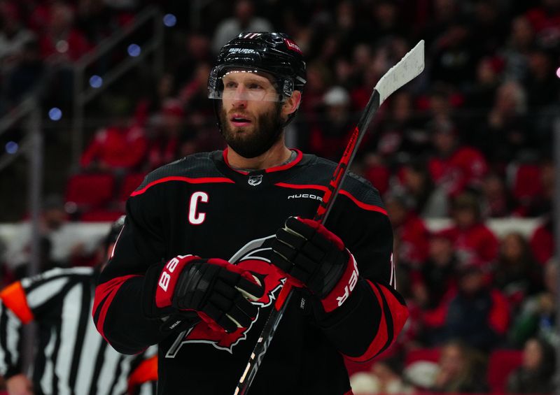 Jan 21, 2024; Raleigh, North Carolina, USA;  Carolina Hurricanes center Jordan Staal (11) looks on against the Minnesota Wild during the second period at PNC Arena. Mandatory Credit: James Guillory-USA TODAY Sports