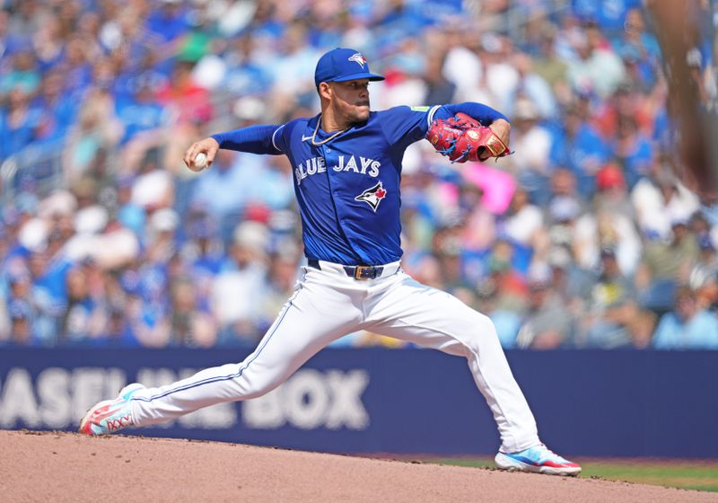 May 20, 2024; Toronto, Ontario, CAN; Toronto Blue Jays starting pitcher José Berrios (17) throws a pitch against the Chicago White Sox during the first inning at Rogers Centre. Mandatory Credit: Nick Turchiaro-USA TODAY Sports