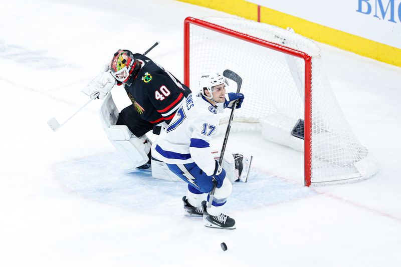 Jan 23, 2026; Chicago, Illinois, USA; Tampa Bay Lightning center Dominic James (17) celebrates after scoring against Chicago Blackhawks goaltender Arvid Soderblom (40) during the shootout at United Center. Mandatory Credit: Kamil Krzaczynski-Imagn Images