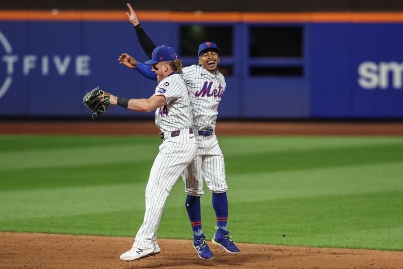 Sep 3, 2024; New York City, New York, USA;  New York Mets center fielder Harrison Bader (44) and shortstop Francisco Lindor (12) celebrate after defeating the Boston Red Sox at Citi Field. Mandatory Credit: Wendell Cruz-Imagn Images