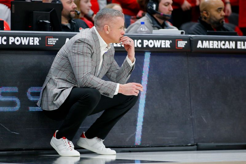 Jan 30, 2024; Columbus, Ohio, USA; Ohio State Buckeyes head coach Chris Holtmann watches time wind down on another loss during the second half against the Illinois Fighting Illini at Value City Arena. Mandatory Credit: Joseph Maiorana-USA TODAY Sports