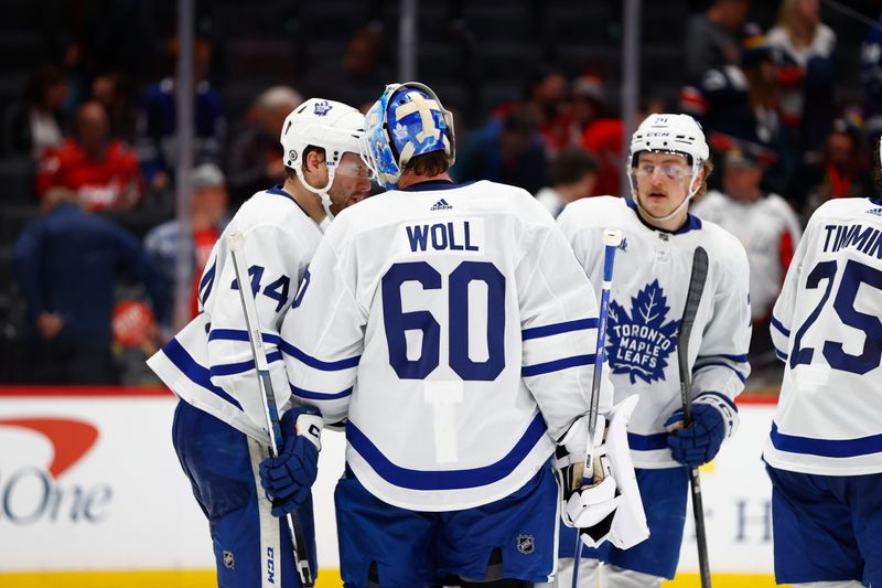 Mar 20, 2024; Washington, District of Columbia, USA; Toronto Maple Leafs goaltender Joseph Woll (60) celebrates with teammates after defeating the Washington Capitals at Capital One Arena. Mandatory Credit: Amber Searls-USA TODAY Sports