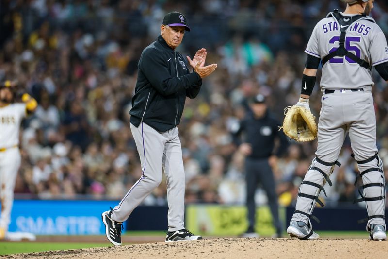 Apr 12, 2025; San Diego, California, USA; Colorado Rockies manager Bud Black (10) claps while making a pitching change during the sixth inning against the San Diego Padres at Petco Park. Mandatory Credit: David Frerker-Imagn Images