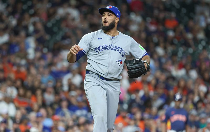 Apr 2, 2024; Houston, Texas, USA; Toronto Blue Jays relief pitcher Yimi Garcia (93) reacts after a pitch during the seventh inning against the Houston Astros at Minute Maid Park. Mandatory Credit: Troy Taormina-USA TODAY Sports