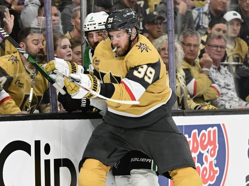 Apr 27, 2024; Las Vegas, Nevada, USA; Vegas Golden Knights right wing Anthony Mantha (39) collides with Dallas Stars defenseman Chris Tanev (3) in the first period in game three of the first round of the 2024 Stanley Cup Playoffs at T-Mobile Arena. Mandatory Credit: Candice Ward-USA TODAY Sports