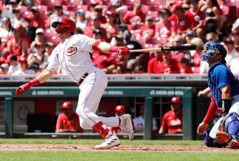 Sep 3, 2023; Cincinnati, Ohio, USA; Cincinnati Reds second baseman Spencer Steer (7) hits a solo home run against the Chicago Cubs during the first inning at Great American Ball Park. Mandatory Credit: David Kohl-USA TODAY Sports