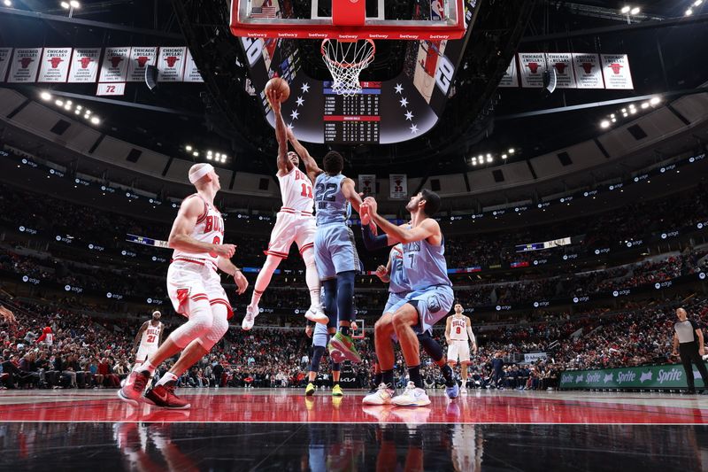 CHICAGO, IL - APRIL 2: DeMar DeRozan #11 of the Chicago Bulls shoots the ball during the game against the Memphis Grizzlies on April 2, 2023 at United Center in Chicago, Illinois. NOTE TO USER: User expressly acknowledges and agrees that, by downloading and or using this photograph, User is consenting to the terms and conditions of the Getty Images License Agreement. Mandatory Copyright Notice: Copyright 2023 NBAE (Photo by Jeff Haynes/NBAE via Getty Images)