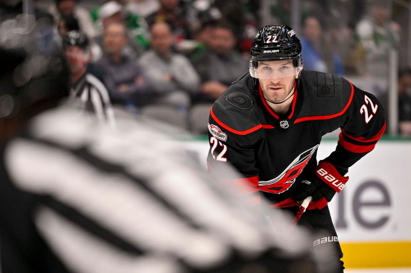 Jan 25, 2023; Dallas, Texas, USA; Carolina Hurricanes defenseman Brett Pesce (22) waits for the face-off in the Dallas Stars zone during the third period at the American Airlines Center. Mandatory Credit: Jerome Miron-USA TODAY Sports