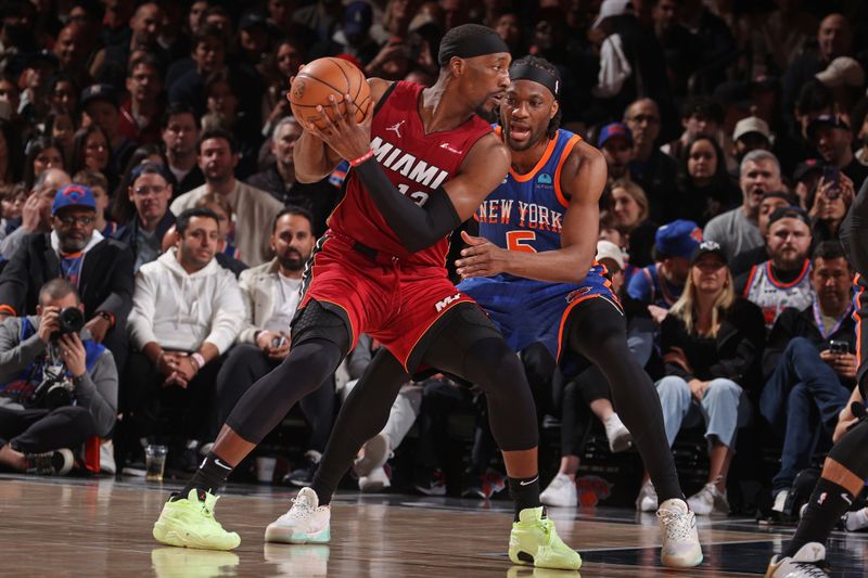 NEW YORK, NY - JANUARY 27: Bam Adebayo #13 of the Miami Heat handles the ball during the game against the New York Knicks on January 27, 2024 at Madison Square Garden in New York City, New York.  NOTE TO USER: User expressly acknowledges and agrees that, by downloading and or using this photograph, User is consenting to the terms and conditions of the Getty Images License Agreement. Mandatory Copyright Notice: Copyright 2024 NBAE  (Photo by Nathaniel S. Butler/NBAE via Getty Images)